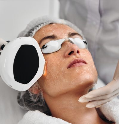 A,Woman,Receives,Ipl,Therapy,In,A,Beauty,Salon.,High